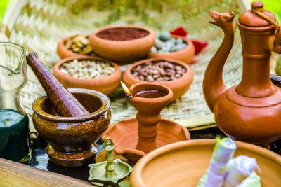 some ayurveda herbal oils and utensils